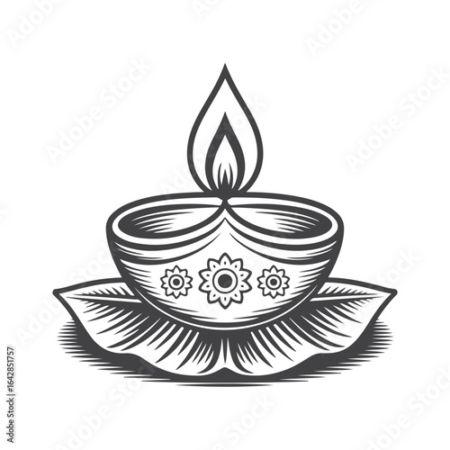 Ornate diya with floral motifs and flame lamp oil lamp