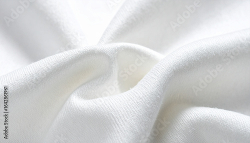 Macro close-up of plain cotton fabric, natural lighting highlighting texture and weave, neutral background, clean and minimal style