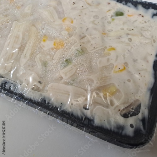 Delicious white sauce pasta close-up