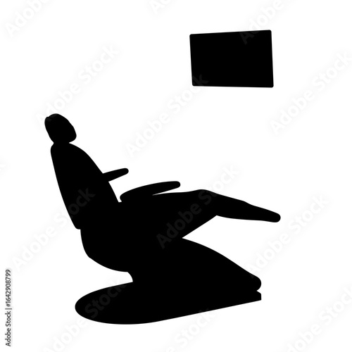 Silhouette of dental chair with ceiling-mounted screen, patient comfort concept
