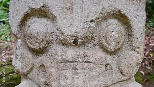 Ancient indigenous statue in San Agustin Archaelogical Park in Colombia