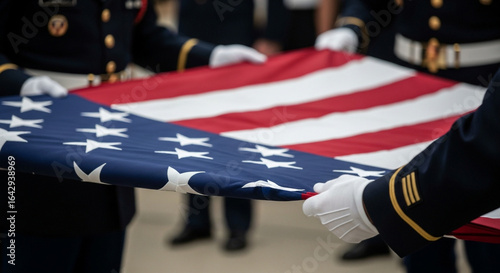 A solemn moment captured as uniformed service members carefully fold the American flag in a military ceremony showing respect honor and tradition for the nation
