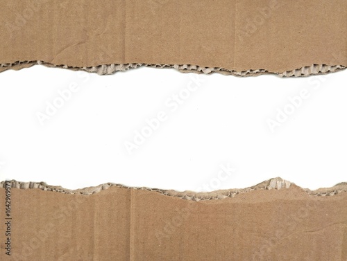 Brown ripped torn cardboard edge strips isolated on white background	