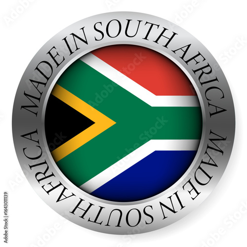 Made in South Africa button icon. Circular emblem with metallic border, glossy central flag, and bilingual label indicating product origin and international manufacturing identity.