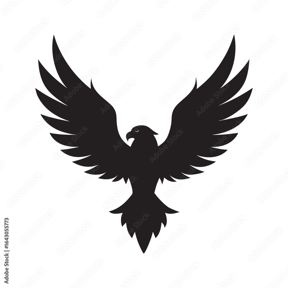 Obraz premium Majestic black silhouette of an eagle with wings spread wide in flight