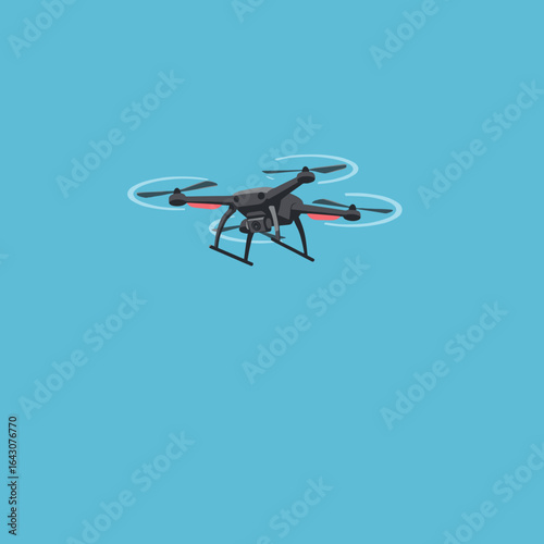 A drone flying against a bright blue sky, capturing aerial footage of a landscape