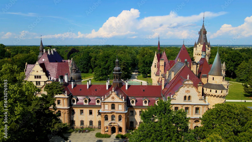 Fototapeta premium Moszna Castle fly over landscape view from above architecture near the village Moszna Poland