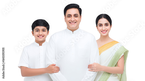 Happy family portrait featuring father, mother, and son, all dressed traditional attire. father wears white kurta, mother is white saree with green accents, and son is white shirt. background