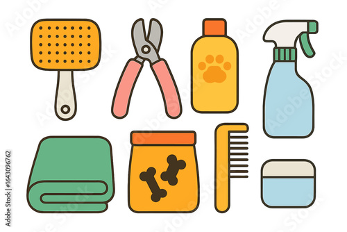 Pet grooming tools and supplies arranged neatly on a white background for easy access