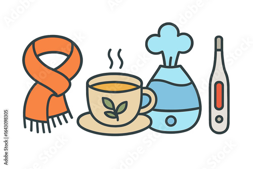 Warm items for a cozy indoor day during the chilly winter season featuring a scarf and tea with a humidifier
