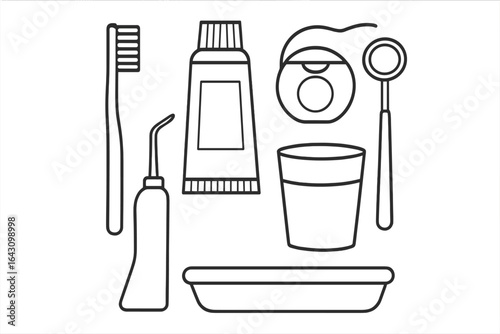 Essential dental care items arranged on a tray in a minimalist style for effective oral hygiene routine