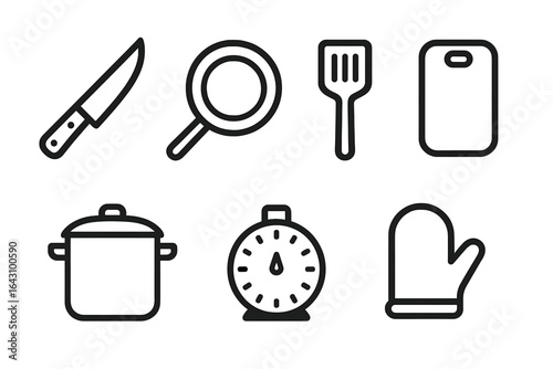Kitchen tools and utensils arranged for cooking activities in a home setting