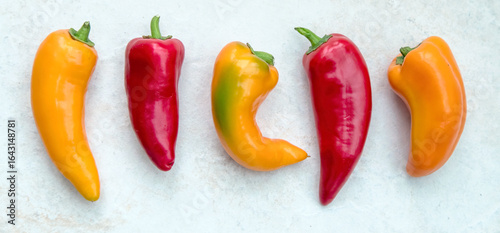 Display of Red and Orange Peppers