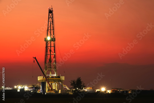 Oil drilling rig at twilight 
