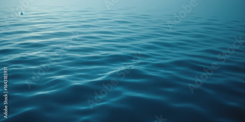 Fotografi Crystal Clear Water Ripples Gentle water ripples create soft, subtle reflections in a serene blue background