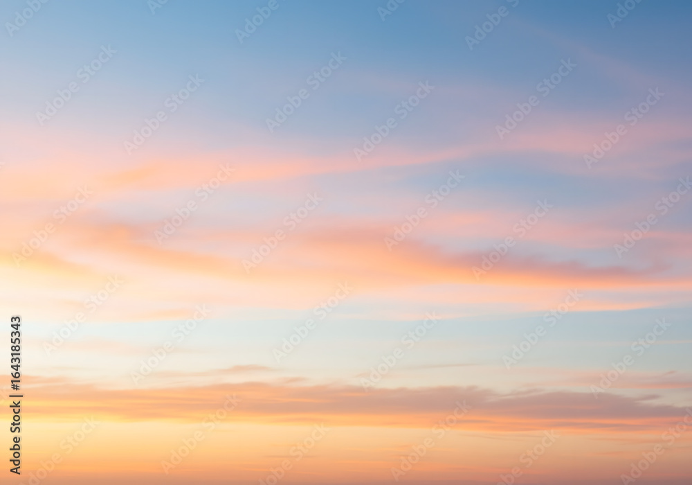Fototapeta premium dawn sunrise sky with pastel clouds along the horizon