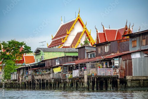 Wooden houses along the Khlong Mong canal on the Thonburi side of Bangkok, Thailand