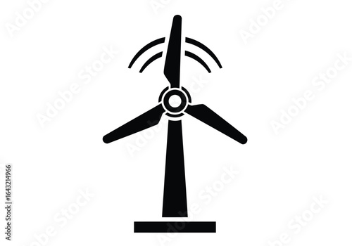 Silhouette of a wind turbine generating renewable energy for a sustainable future and a cleaner environment