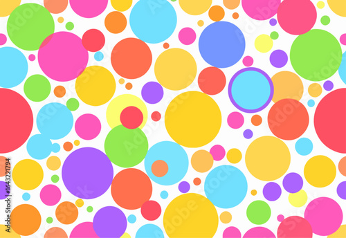 Bright candy-like circles bouncing across a happy background like confetti at a party.