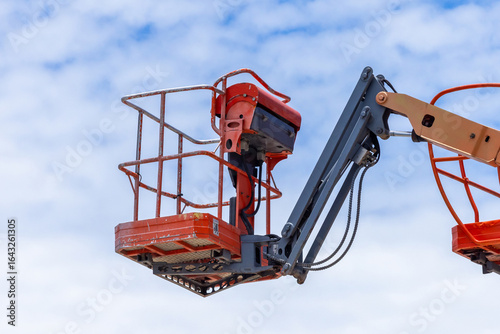 Wallpaper Mural Articulate boom lift with blue sky background, Aerial platform lift telescopic boom lift hydraulic boom lift, Mobile construction crane, Construction boom lifts Torontodigital.ca