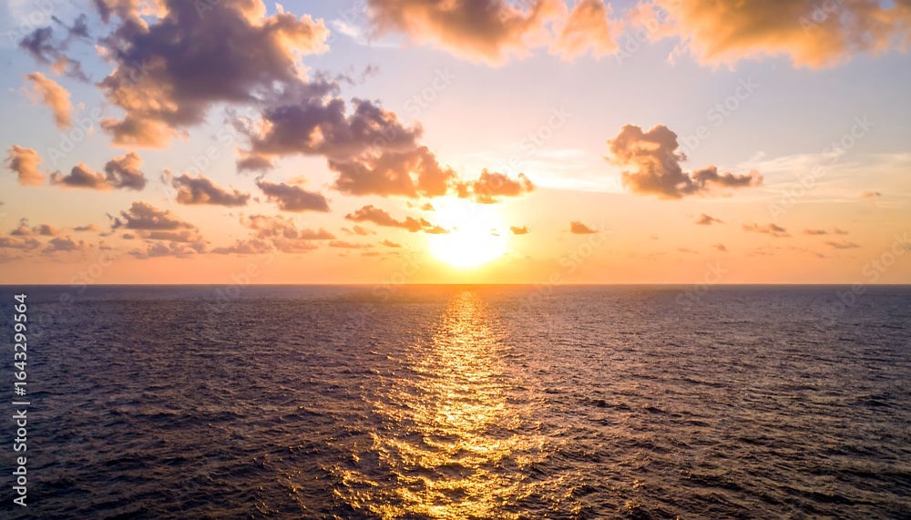 Obraz premium Sunset over calm ocean