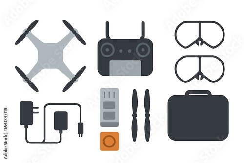 Various components of a drone setup including controller, battery, and accessories displayed on a flat surface