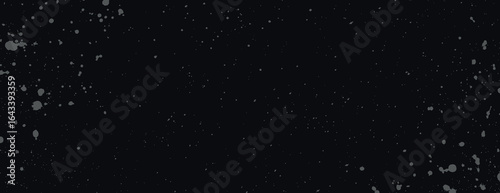 Dark black background with a black splatter texture, creating a grunge style. The background is black with scattered splatters. Aesthetic background vector. Black background.