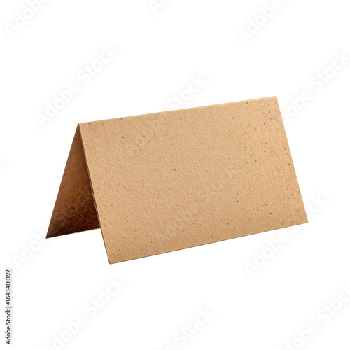 Minimalist blank brown kraft paper card standing folded, ideal for product mockups, invitations, or business branding.

