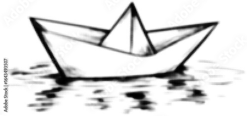 Black and white halftone paper boat floating on rippled water surface