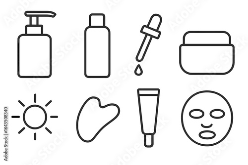 Skincare products and tools displayed for a beauty routine on a simple backdrop during daylight