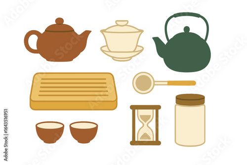 Teapot, teacups, and tea accessories arranged on a flat surface for a relaxing tea ceremony experience