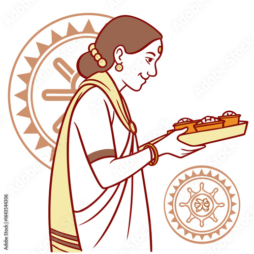 A woman in traditional indian attire offers a tray of sweets with dharmachakra symbols in the background