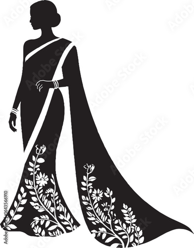 a silhouette of a woman wearing a sari