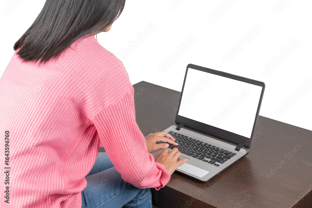 Naklejka premium Woman Typing on Laptop at Wooden Table (Isolated)