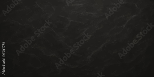 Textured black chalkboard surface with abstract white chalk grunge pattern for a dark and rough background design