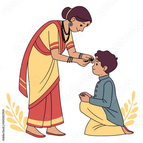 Indian mother applying a tilak to her son s forehead during a traditional ceremony or festival celebration
