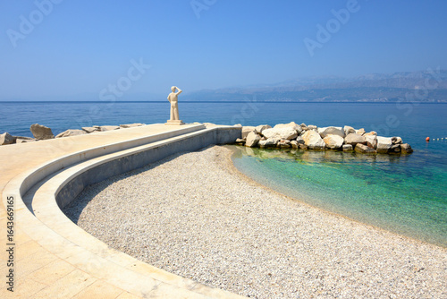Fototapeta Naklejka Na Ścianę i Meble -  Rot beach located in the center of Postira. Brac island, Croatia