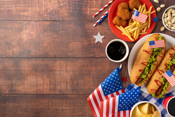 Labor Day and Independence Day picnic party concept featuring delicious American cuisine, including hot dogs, fries