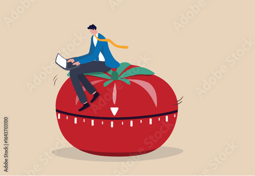 Pomodoro technique to increase work productivity, set timer to focus work and break or rest concept, smart businessman focus on working with laptop computer sitting on Pomodoro tomato timer stopwatch.