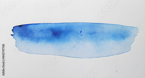 A blue watercolor brushstroke on a white background
