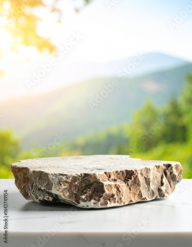 Rough stone slab on a white surface, scenic background