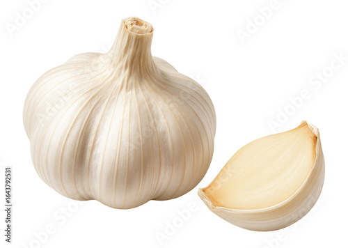 Top view of garlic bulb and slice on.