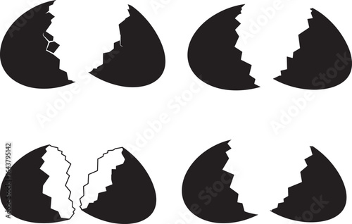 Four cracked egg shells in silhouette