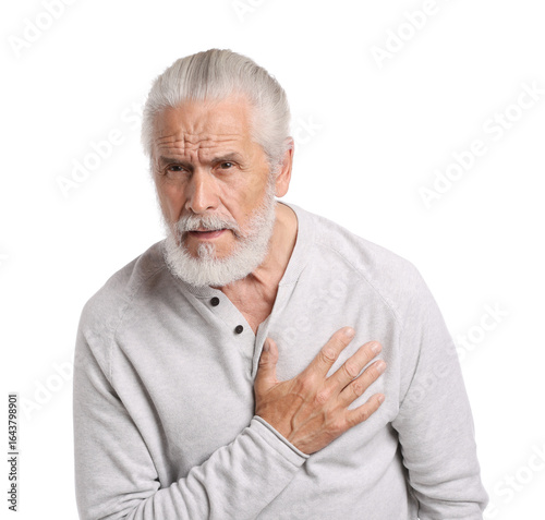 Wallpaper Mural Senior man suffering from chest pain on white background Torontodigital.ca