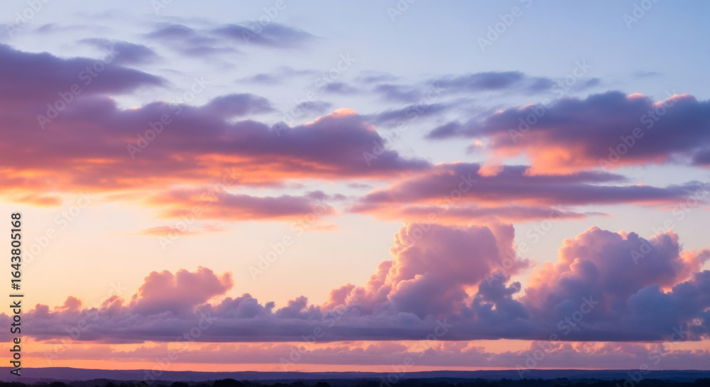 Fototapeta premium Soft Light and Pastel Colored Cumulus Clouds at Sunset Landscape