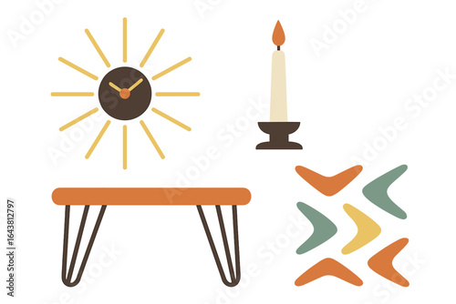 Decorative elements on a minimalistic table featuring a clock, candle, and artistic shapes in a cozy setting