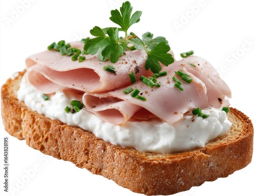 Toasted bread topped with creamy cottage cheese, thinly sliced pale pink deli meat, fresh chives, and parsley sprigs