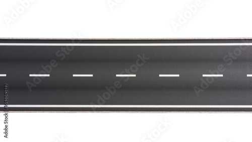 Aerial view of straight asphalt road with white lane markings, creating sense of openness and tranquility