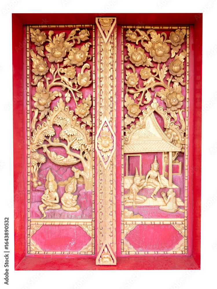 Fototapeta premium Ancient Thai Buddhist temple door decoration with a detailed golden angel sculpture and intricate cultural patterns
