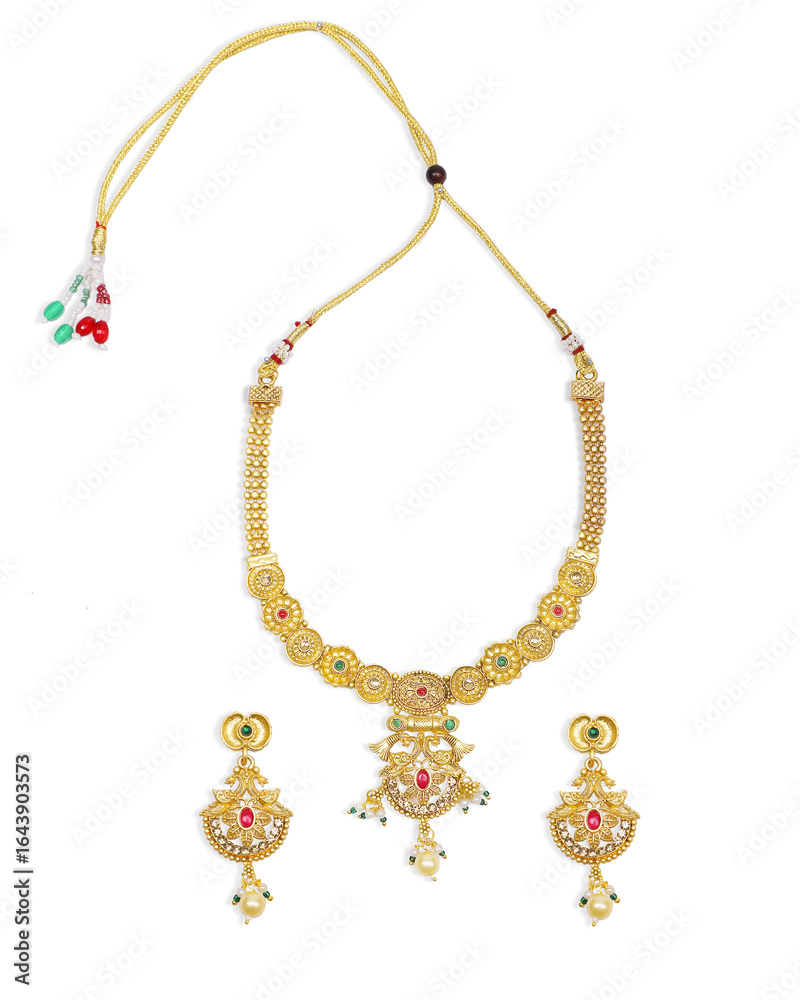 Fototapeta premium Gold Plated Necklace with Red and Green Gemstone Accents
